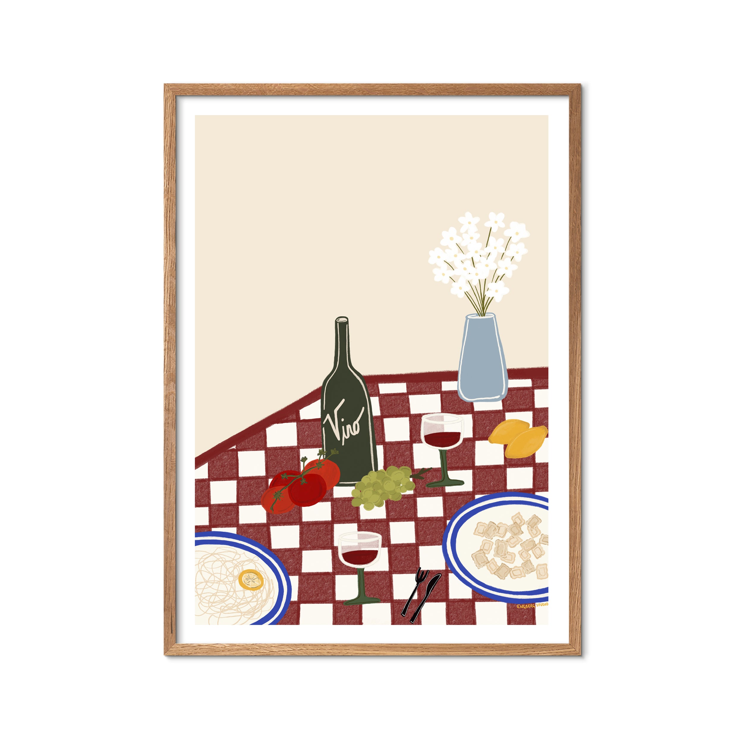 a checkered table set with pasta, wine, citrus, and fresh flowers