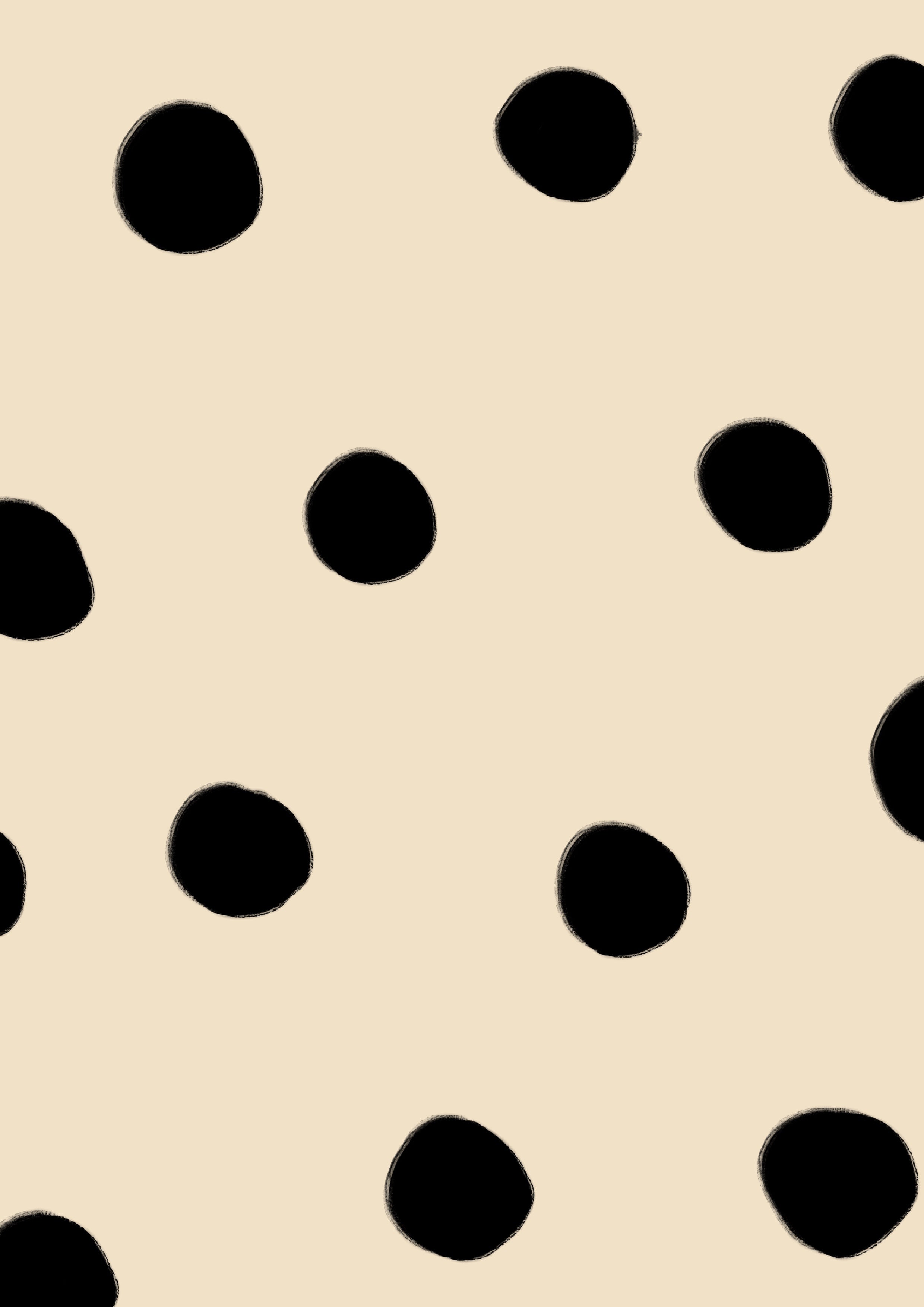 Beige background with black polka dots