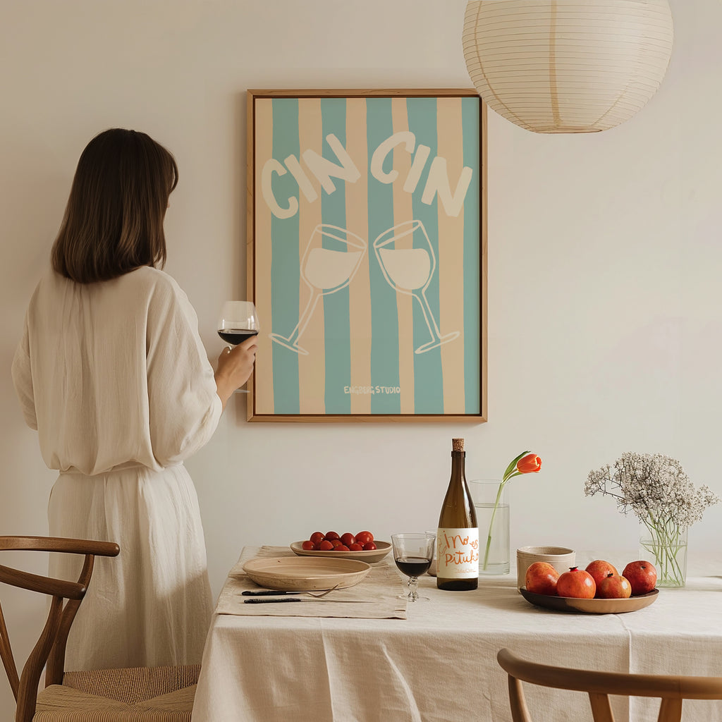 Featuring two clinking wine glasses outlined in white over vertical blue and beige stripes